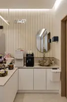 ㄱ자 동선의 에스테틱 고객 서비스존 인테리어